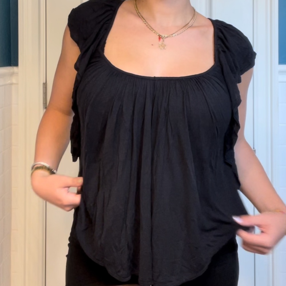 Free People black blouse in a size small.